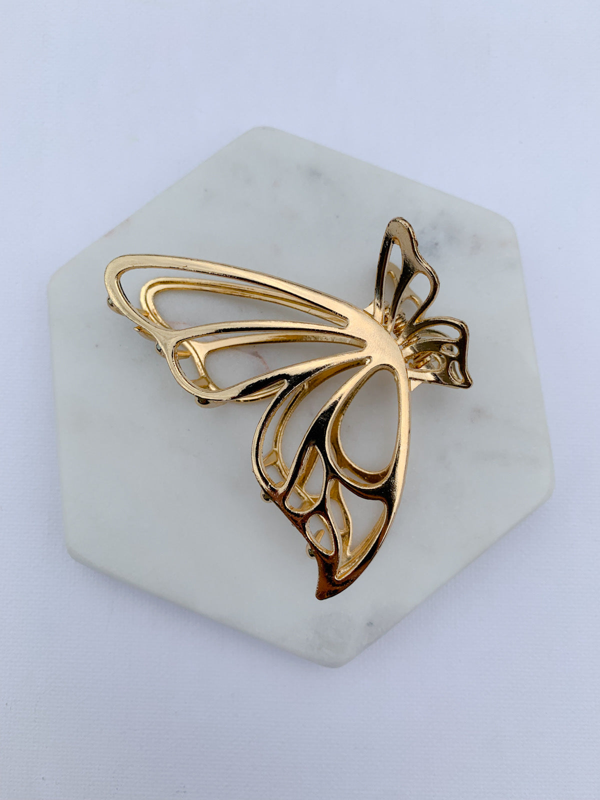 Medal butterfly claws