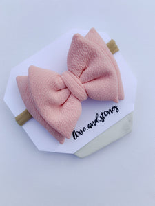 Stuffed bouncy baby bows (various colours)